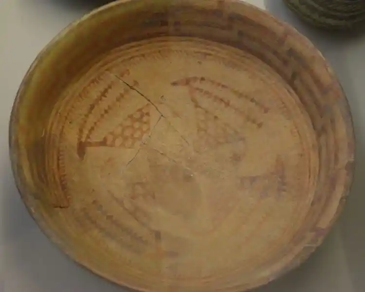 Bowl with goats in the form of a swastika